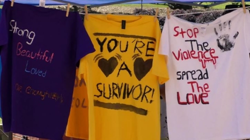 T-shirts displayed at the Macon Campus Clothesline Project.